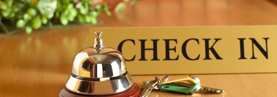 Vintage old hotel bell on the table